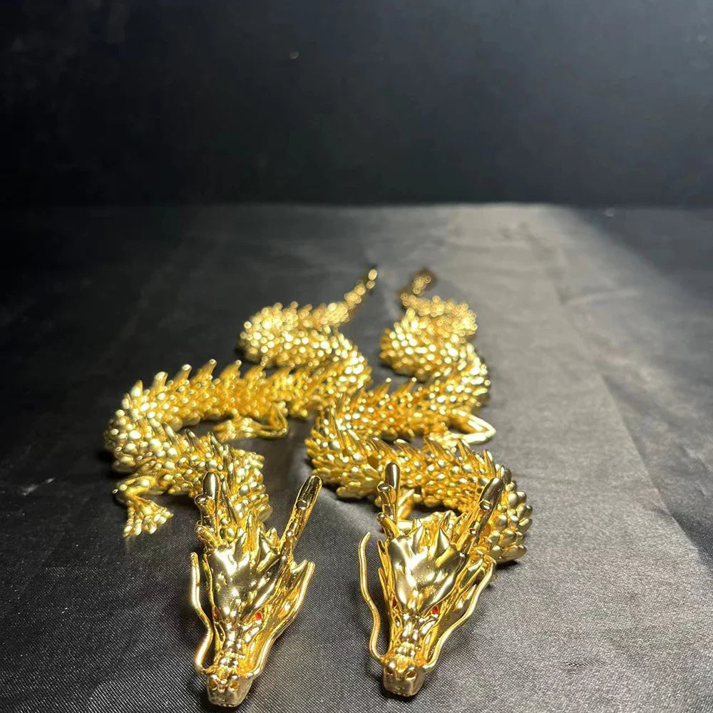 Dragon perched beside stacked books on a shelf
