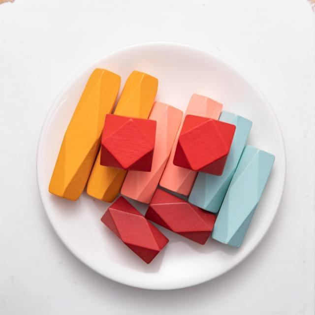 Bright red and blue stones highlighted among the set
