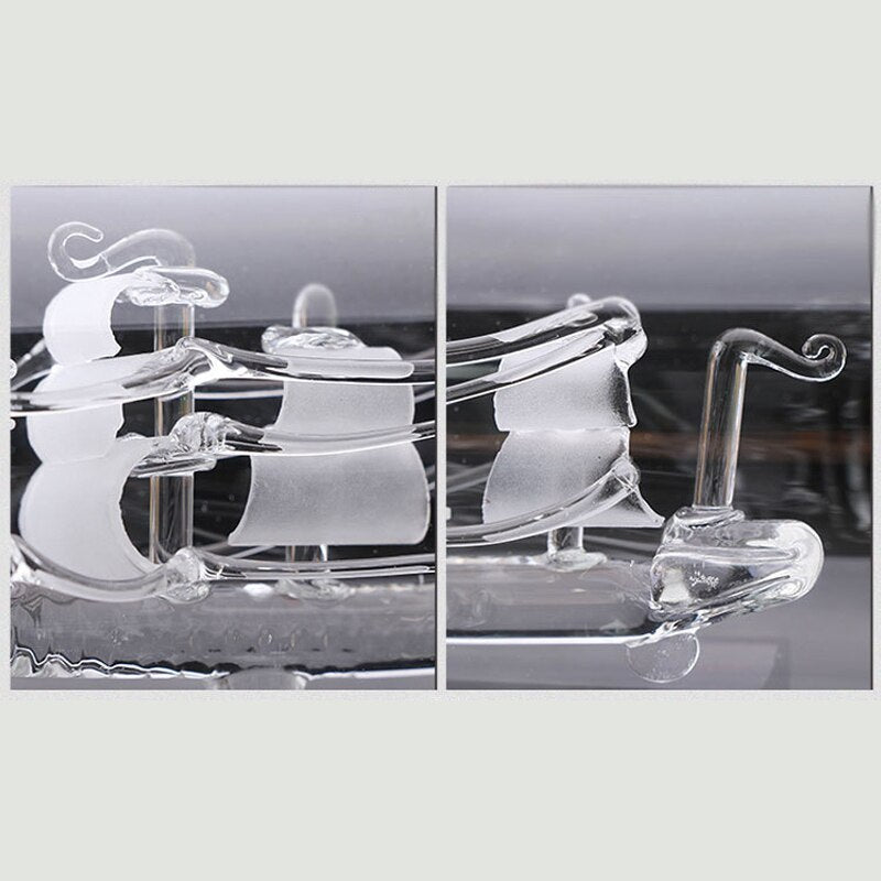Close shot of ship masts and sails inside bottle