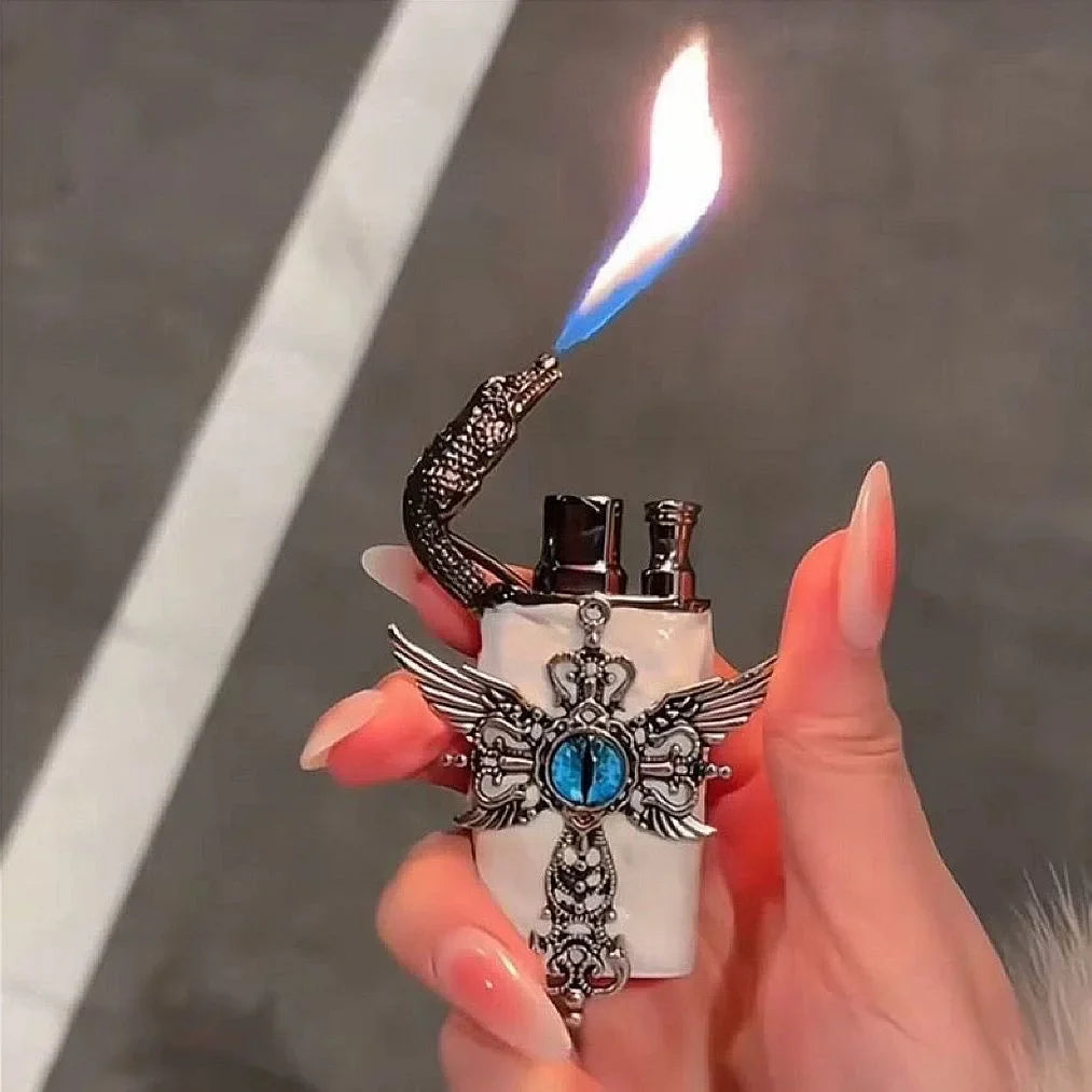 Lighter beside a candle and small accessories