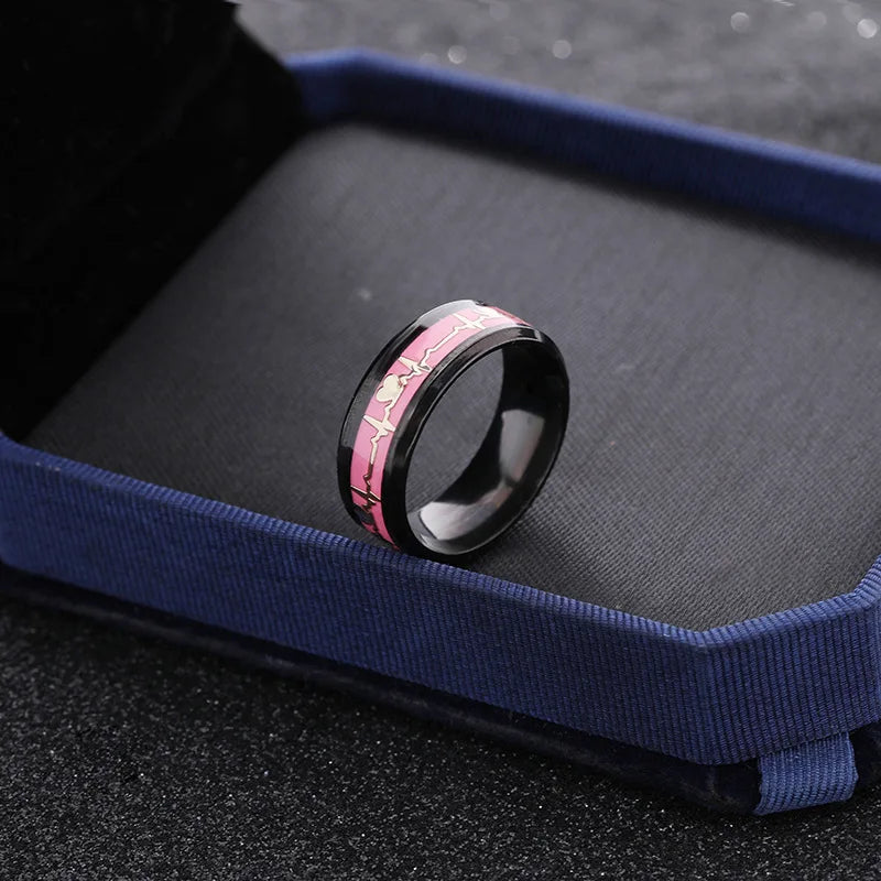 Rings presented in tasteful gift box for couples