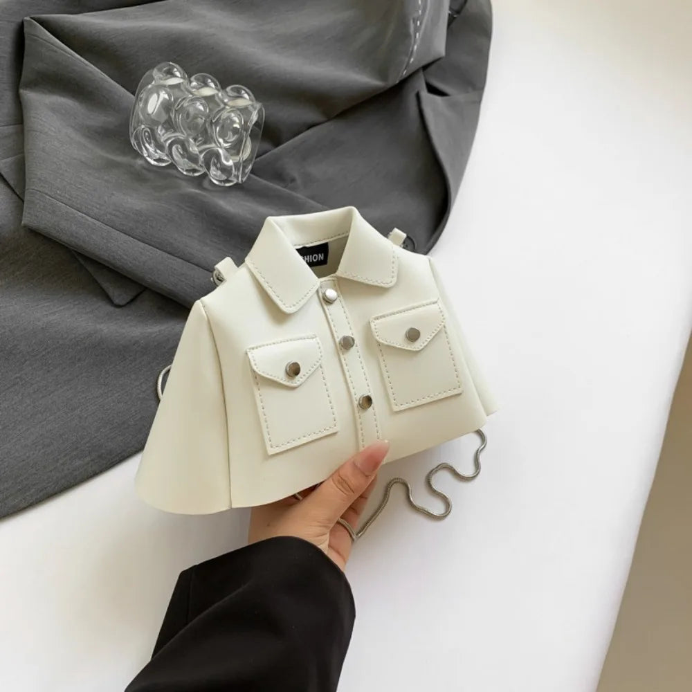 Interior zip pocket and card slots inside Kyoto Alley Jacket Purse