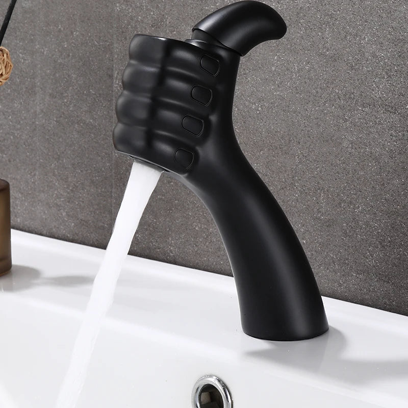 Black finish thumbs-up tap attachment for a minimalist sink
