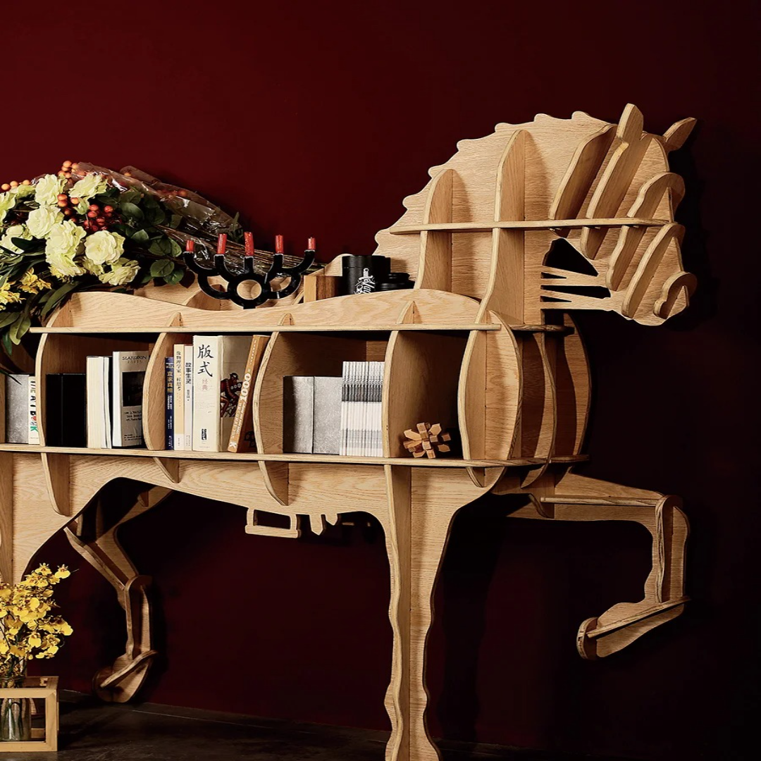 Horse bookshelf in a nursery holding stuffed animals and children