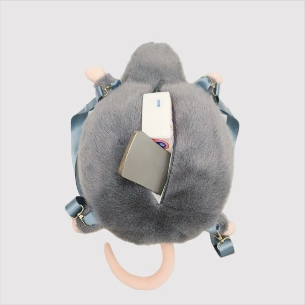 Top-down view inside the zippered compartment of the Chubby Mouse Backpack