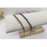 Bracelets Amélie pour femme. Perles rondes aplaties en cristal et heishi en inox doré. Deux couleurs de cristal au choix, rose ou améthyste.