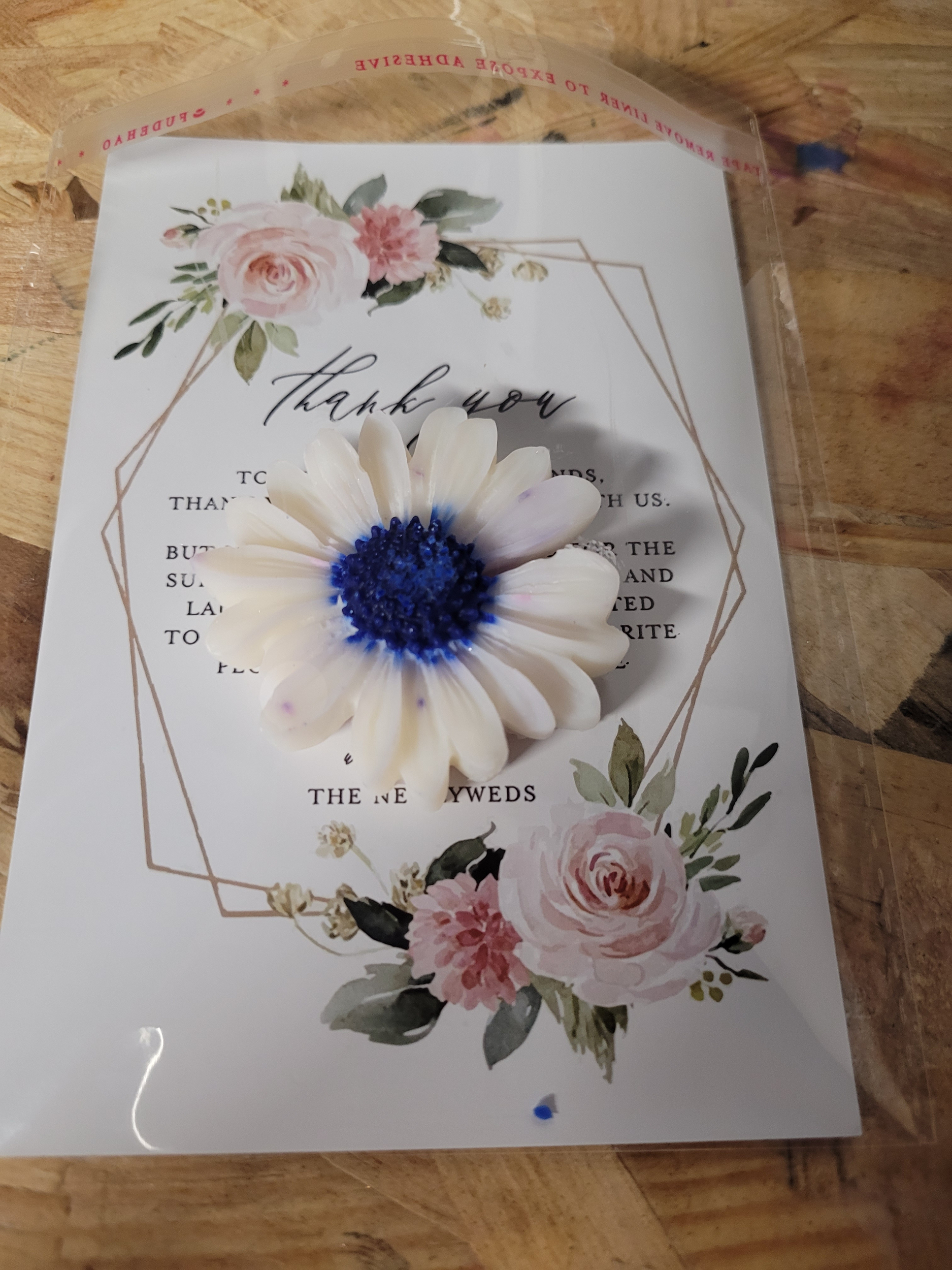 bougie-merci-fleur-blanche-bleue