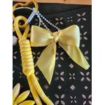 Bijoux de sac avec noeud jaune