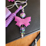 Bijoux de sac papillon mauve