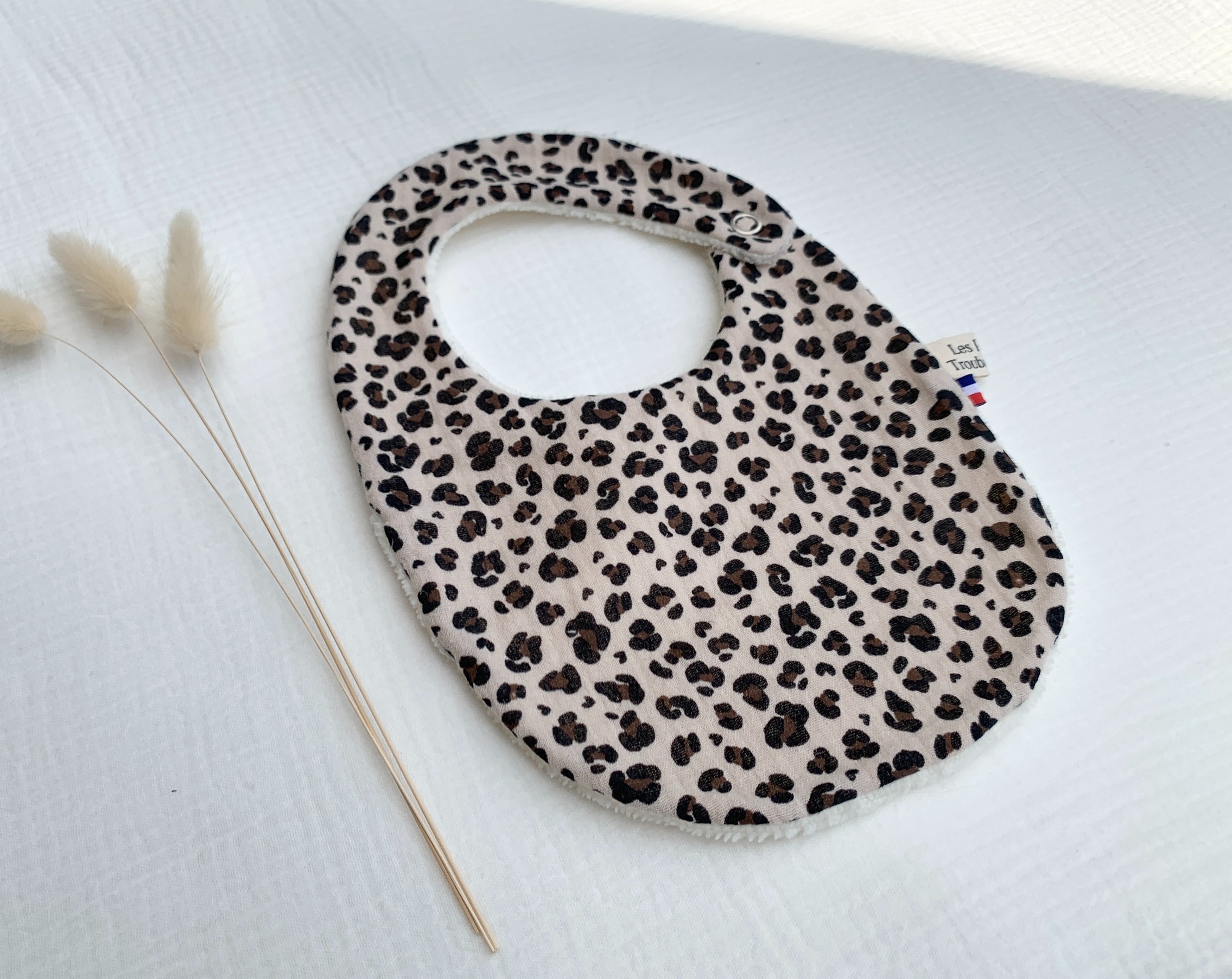 bavoir double gaze de coton leopard black