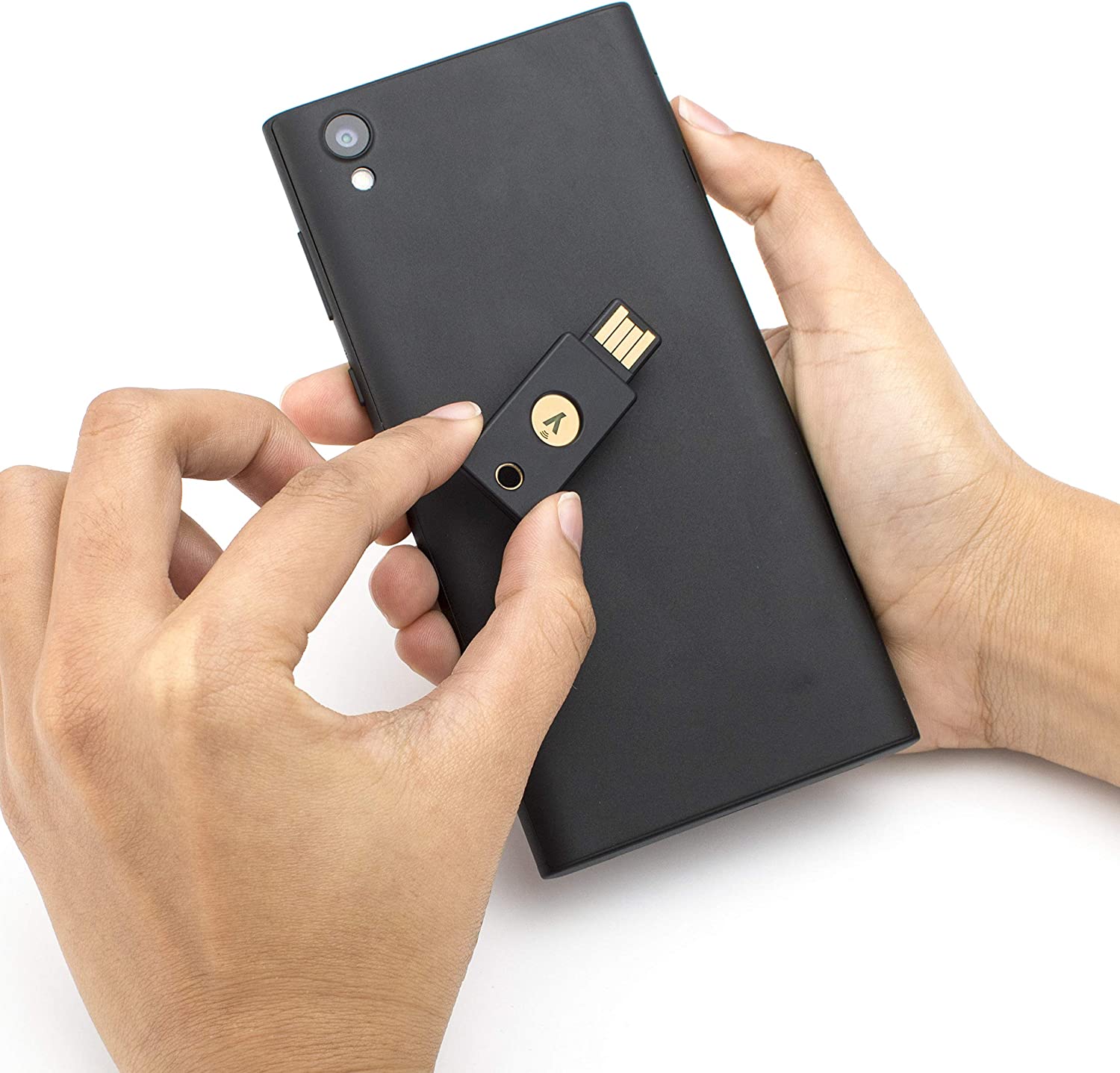 YubiKey 5 NFC touching back of phone