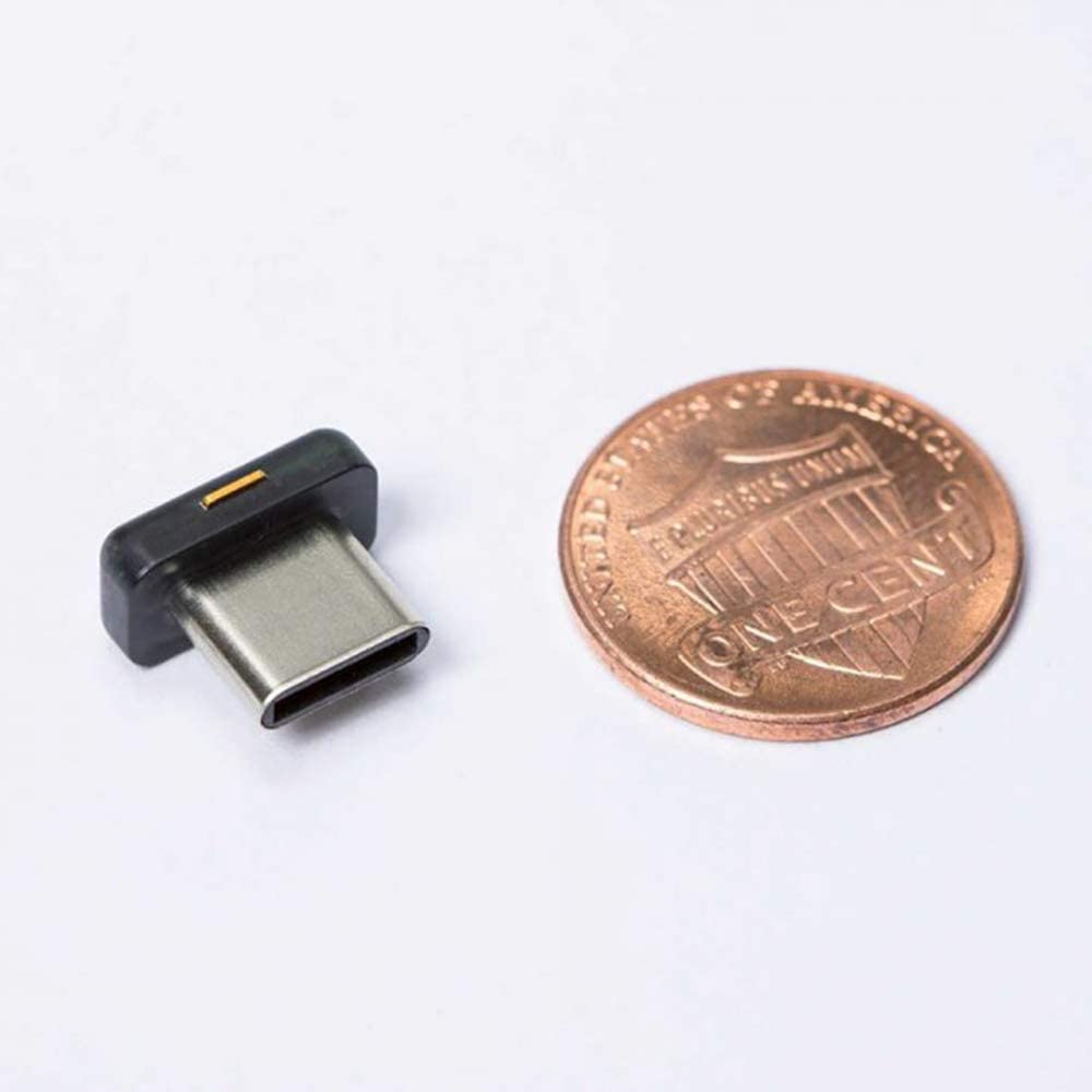 YubiKey 5C Nano next to a penny