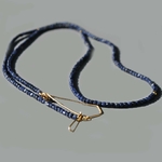 sautoir or et saphir bleu