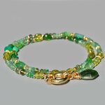 collier multipierres vertes anneau or(1)