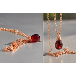 Diptyque de collier en or rose et grenatաժողով