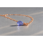 Collier rose doré et pendentif violet