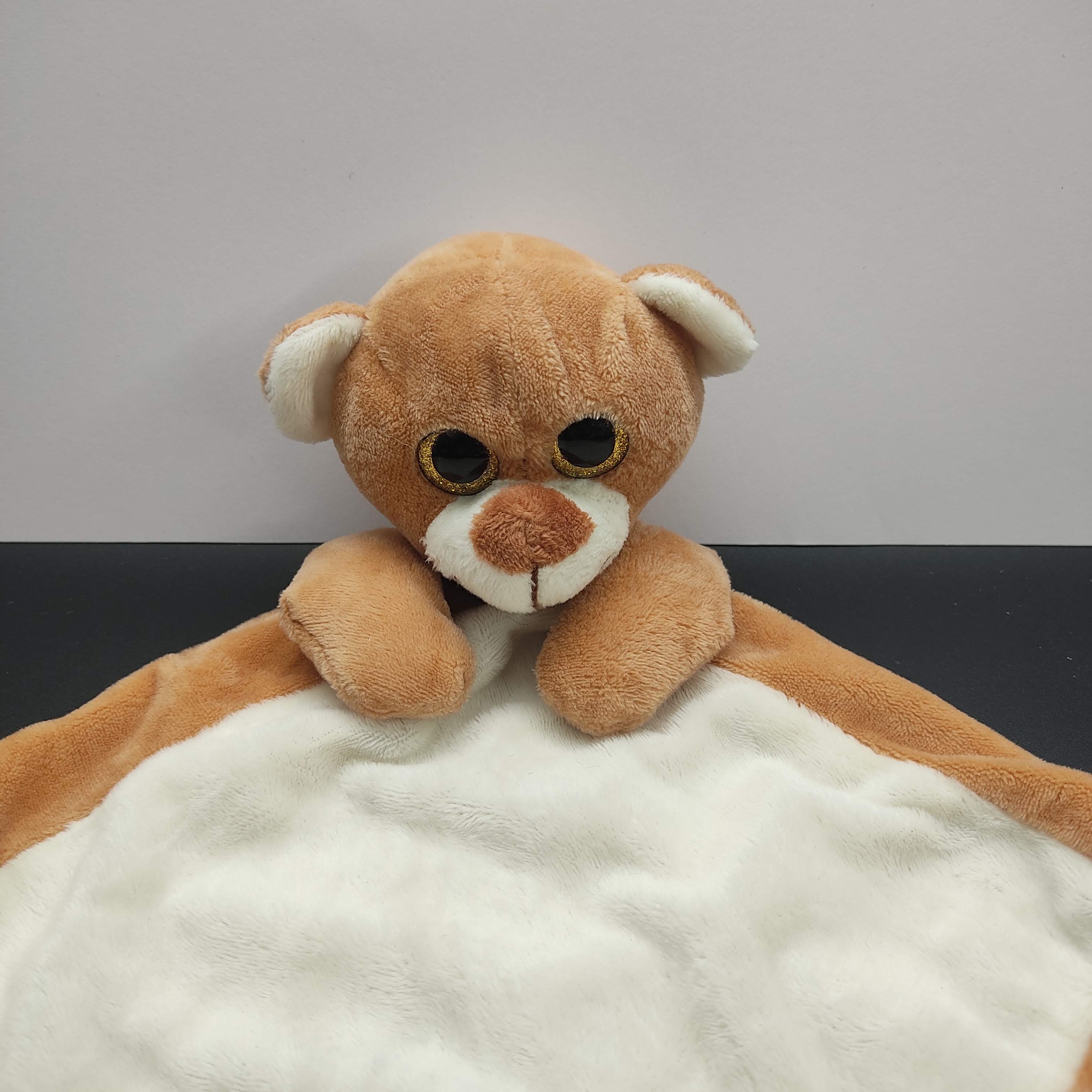 Doudou personnalisé lion grand yeux