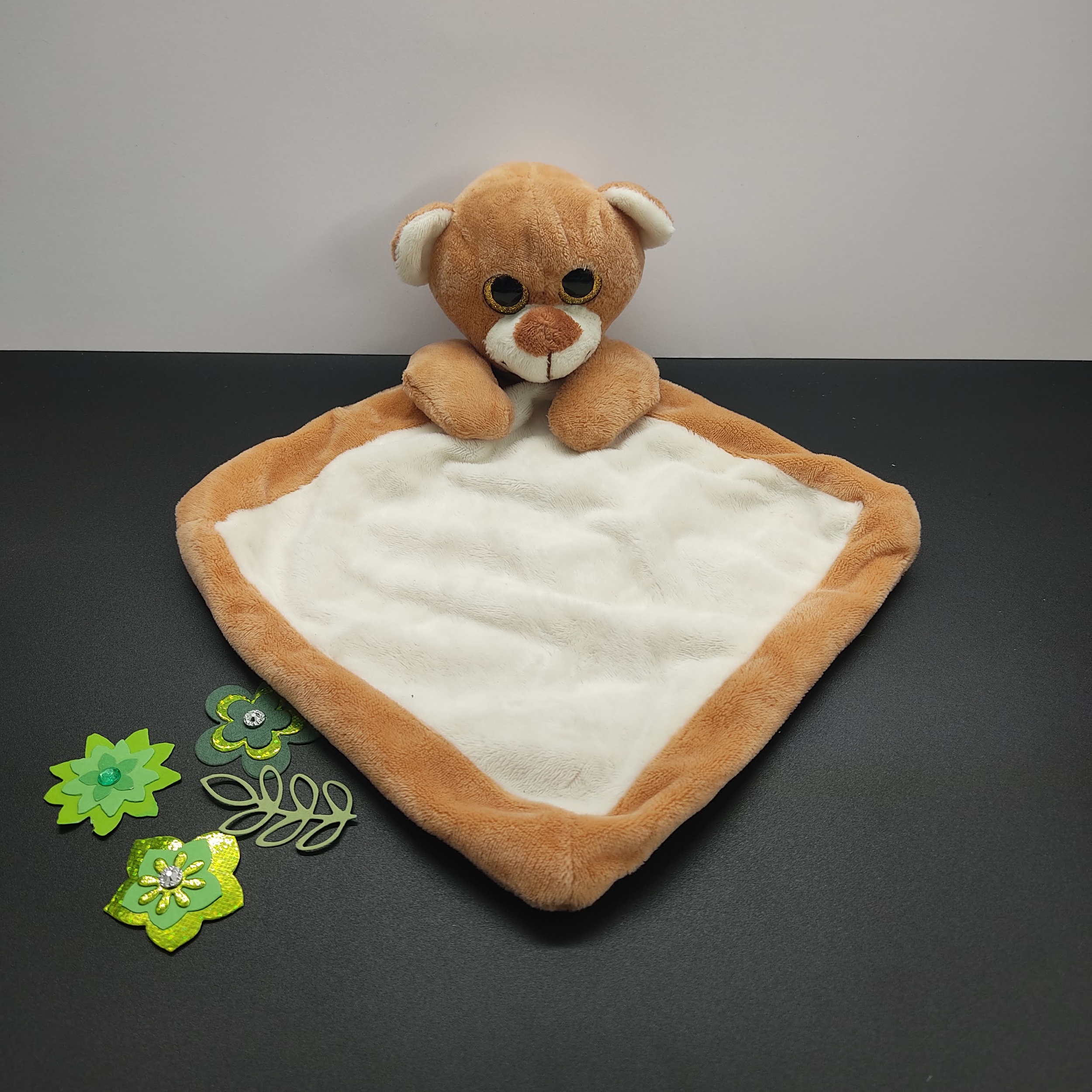 Doudou personnalisé lion grand yeux