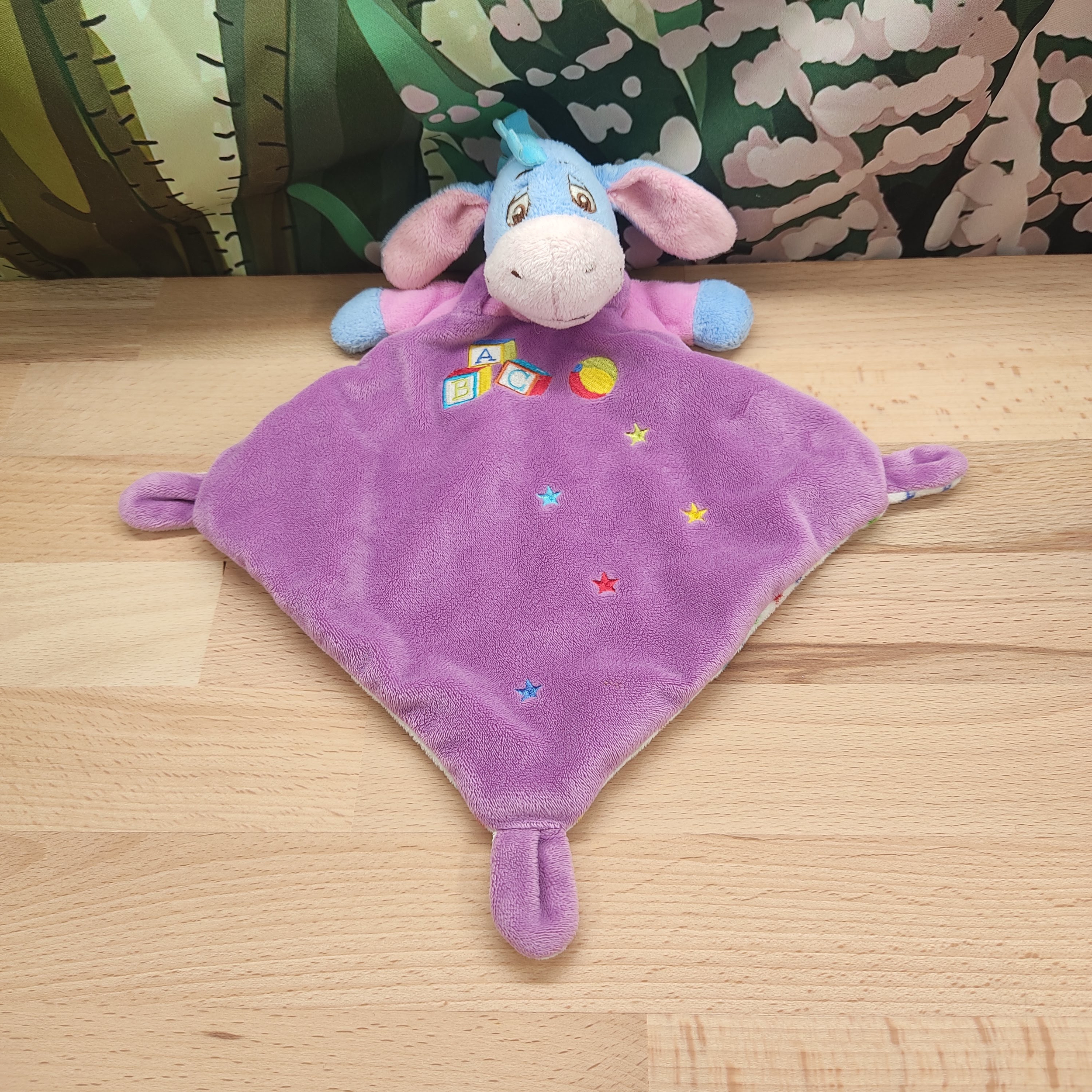 Doudou bourriquet violet