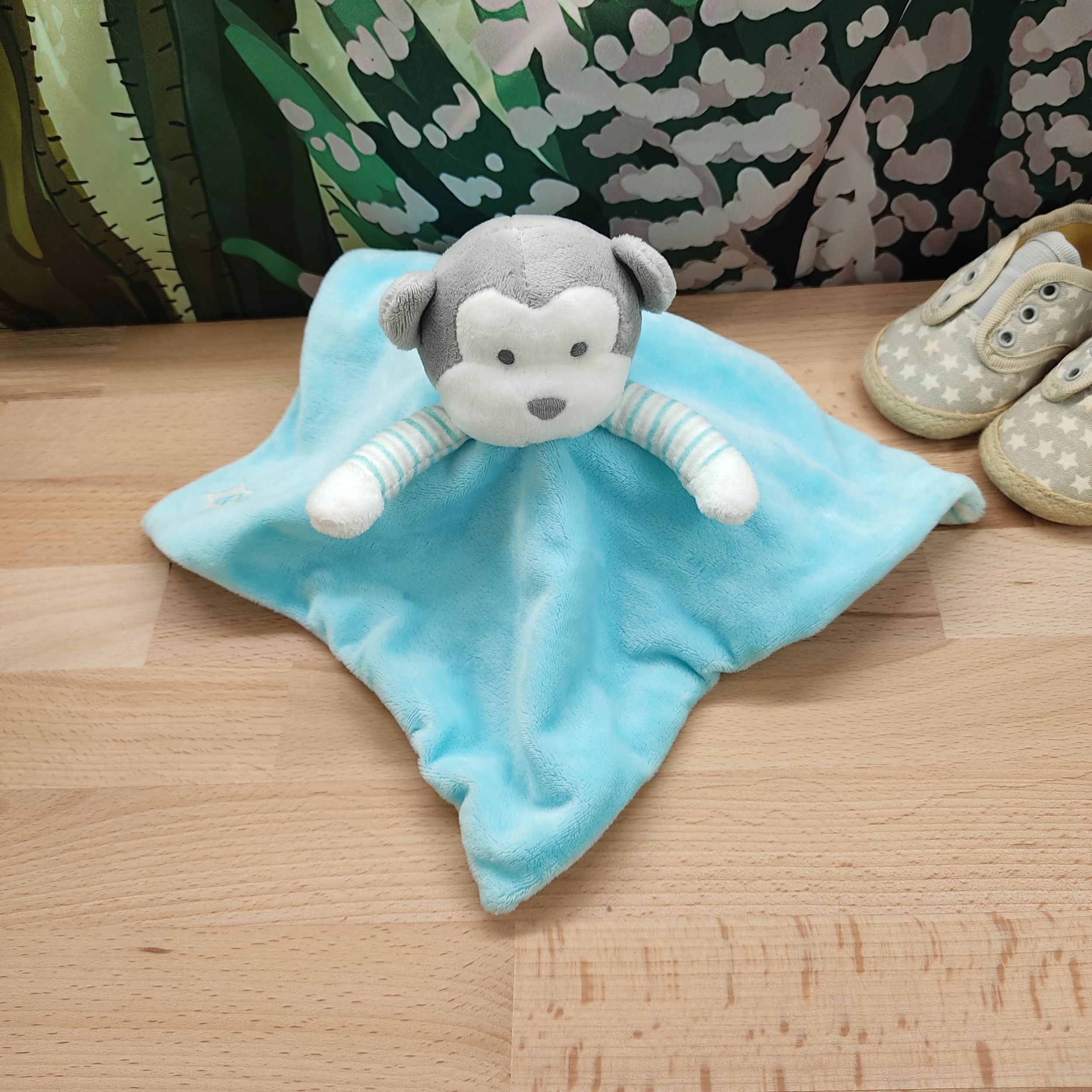 Doudou singe bleu