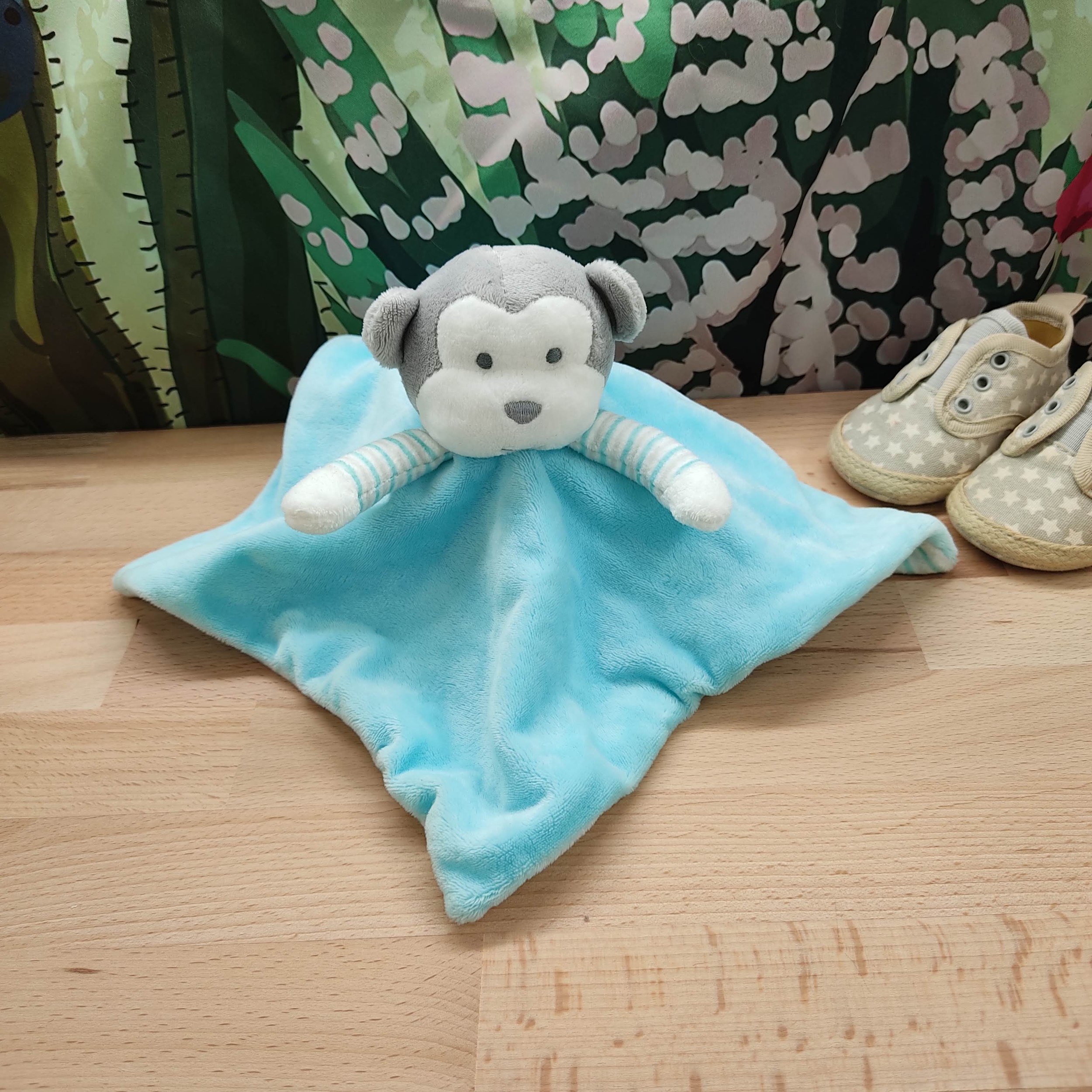 Doudou singe bleu