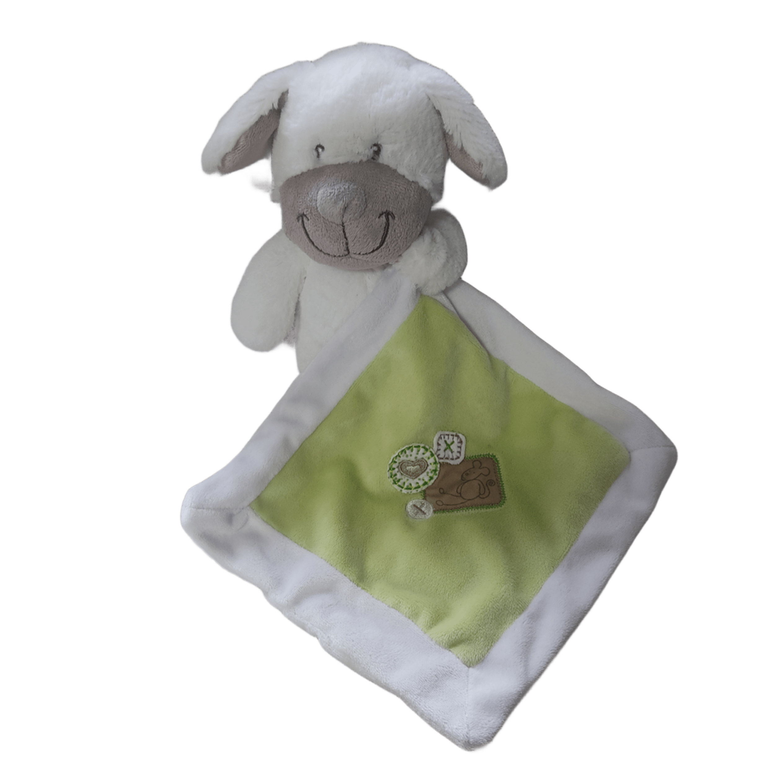 Doudou chien blanc et vert photo