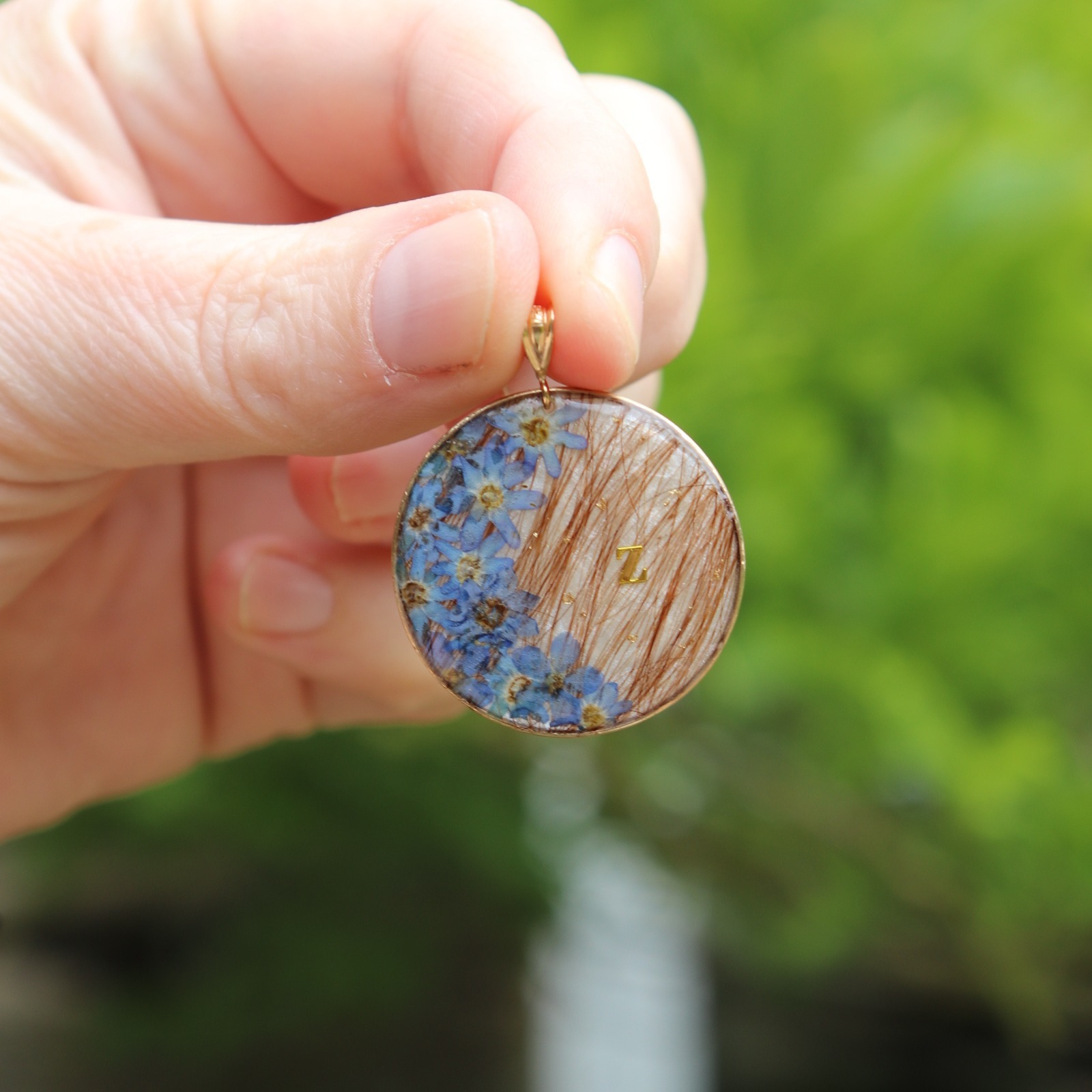 Collier souvenir croissant de lune cheveux defunt bebe mamange