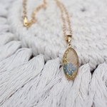 collier poils de chien fleurs sechees resine bijou funéraire