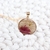 Collier souvenir poils de chien fleur sechee or lamine