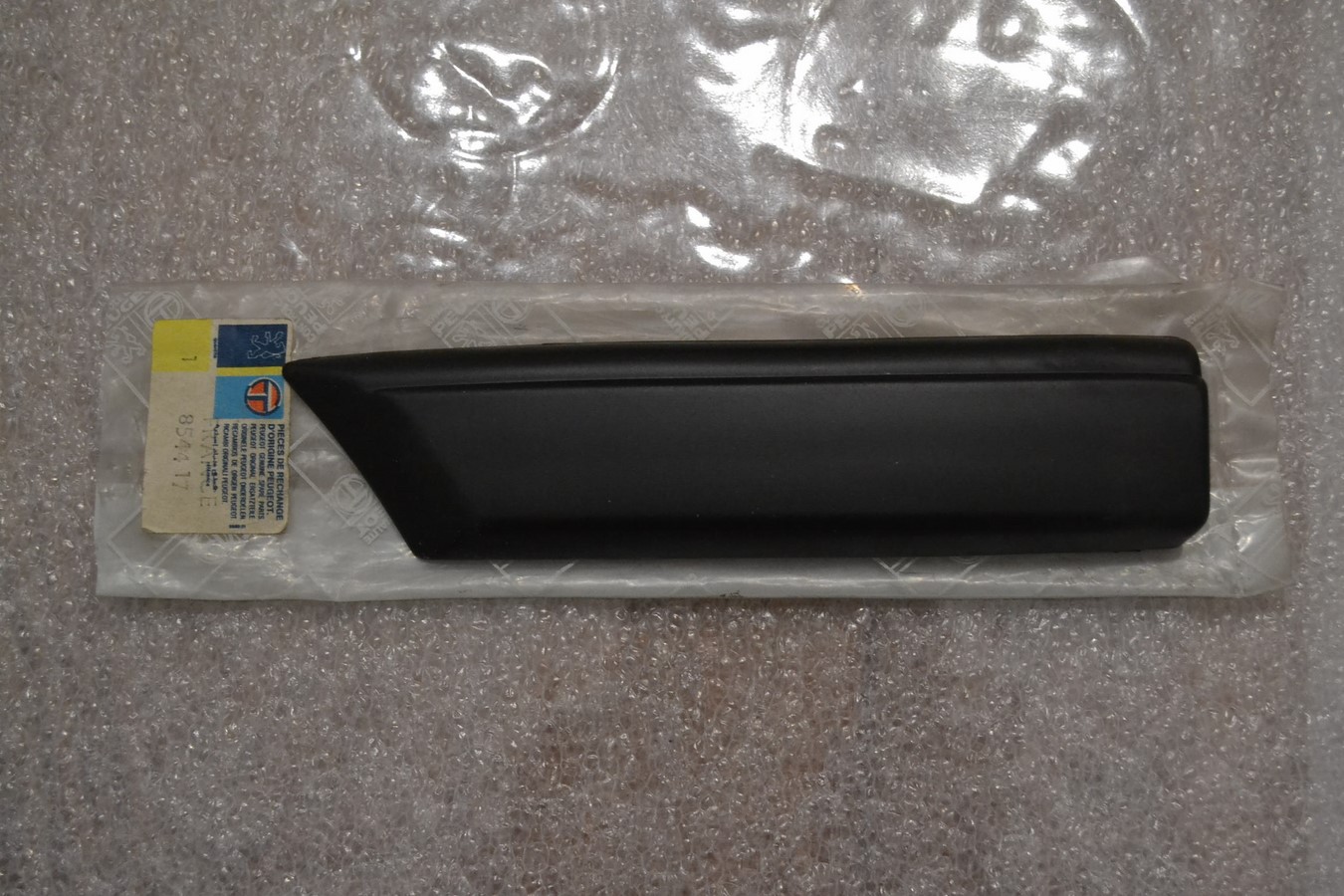 Protecteur / baguette aile avant gauche Peugeot 405