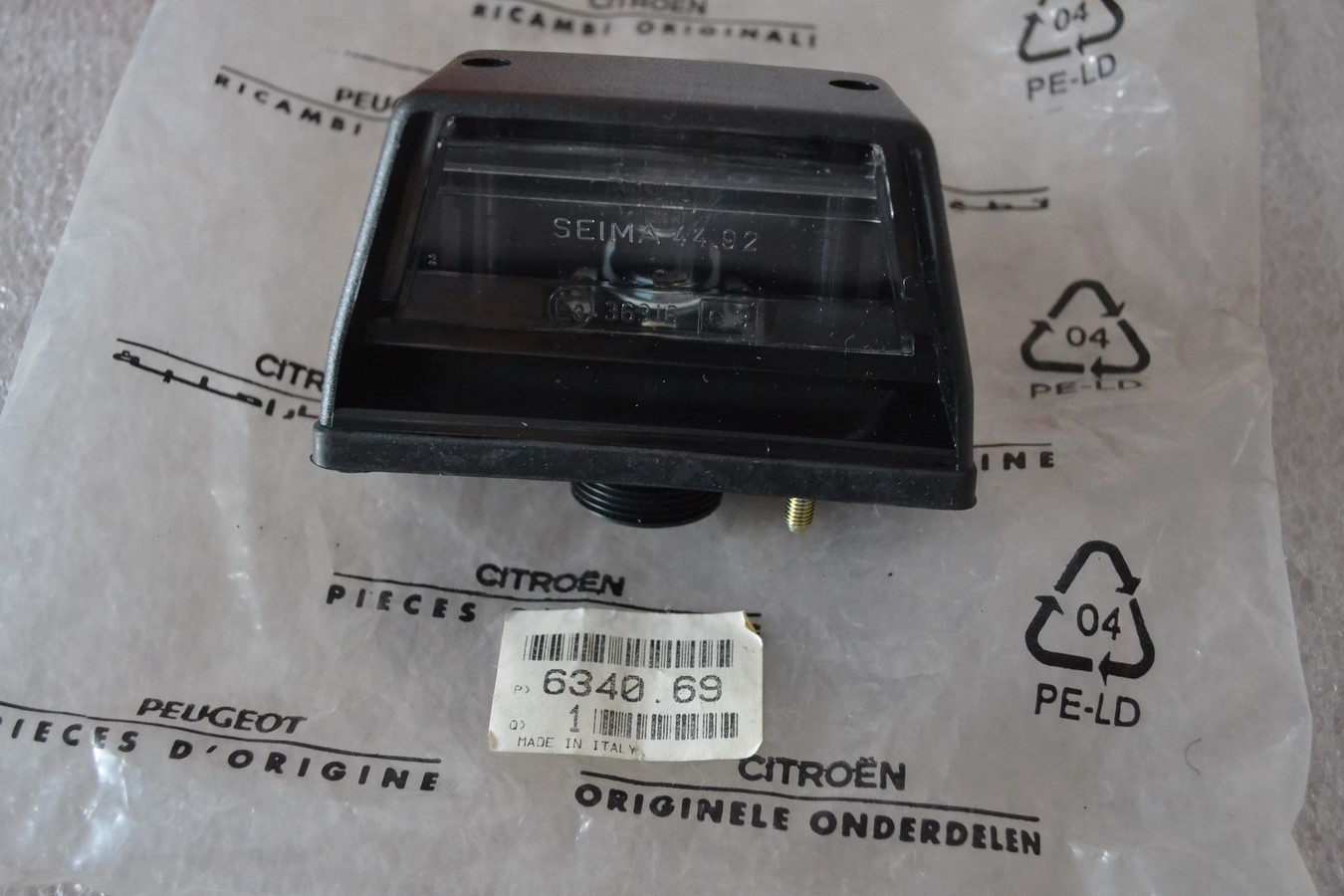 Eclaireur plaque complet arrière gauche Peugeot / Citroen / Fiat