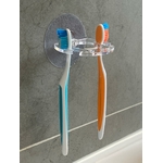 Porte-brosse à dents et dentifrice mural adhésif transparent discret brosse à dent bleu et orange.
