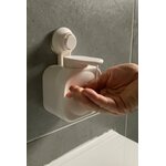 Distributeur de savon liquide blanc avec la main
