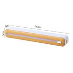Distributeur de film alimentaire orange avec dimensions.