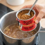 pot-fond-brun-deshydrate-devant-casserole
