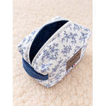 Pochette matelassée JTOOM sur tapis crème