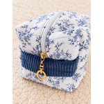 Trousse florale bleue et dorée