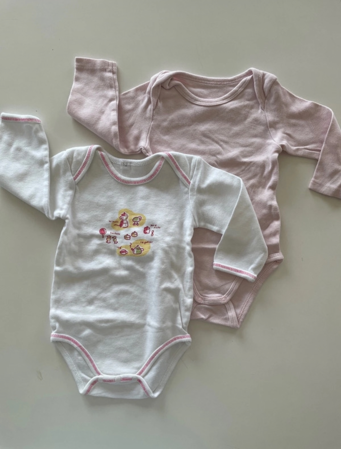 Lot de 2 bodies rose et blanc manches longues, 12 mois