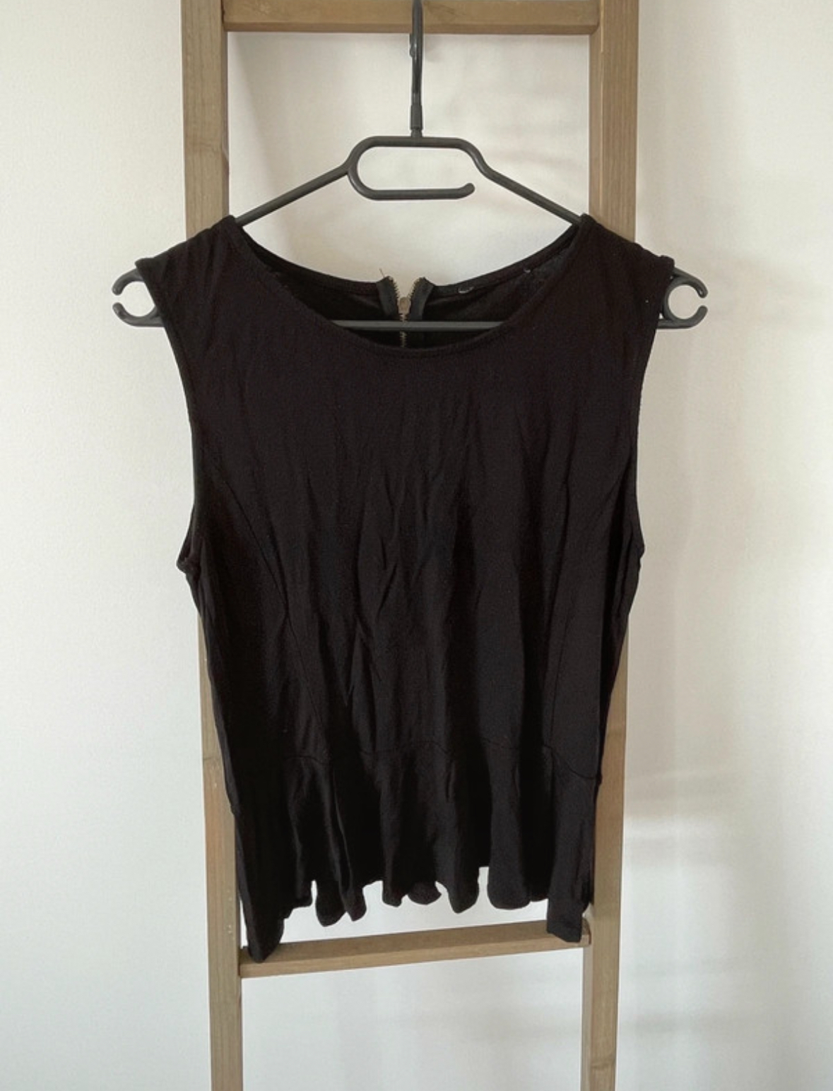 Top noir peplum sans manche, 40
