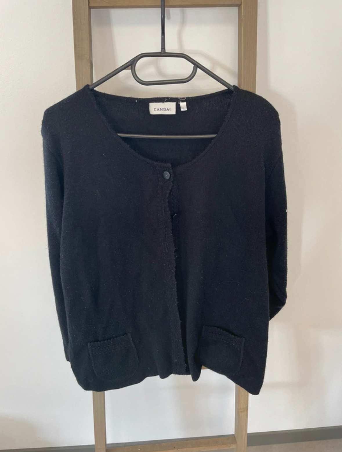 Gilet noir, Canda, L