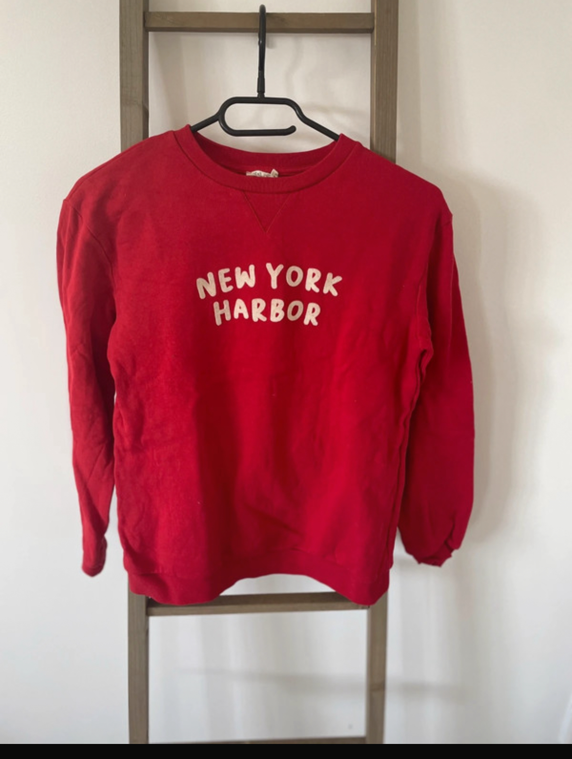 Pull rouge, Little Cigogne, 14 ans