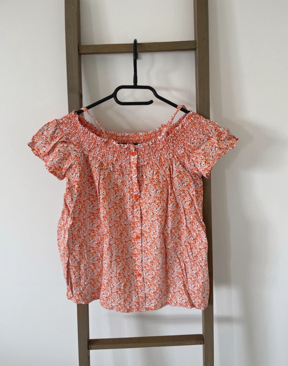 Top orange, Gémo, 14 ans