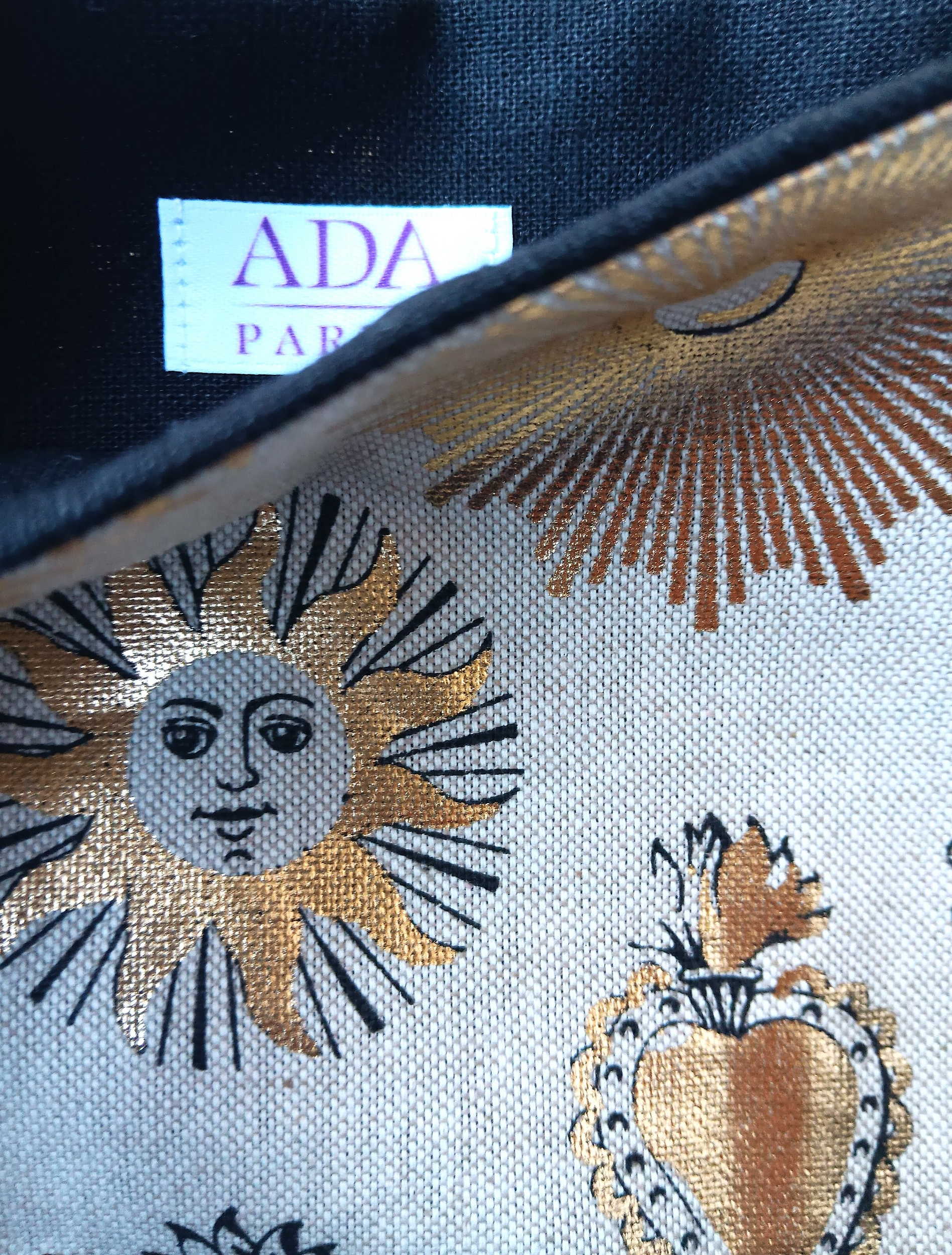 Pochette à livres soleil coeur noir et doré