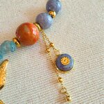 détail collier Envol asymétrique