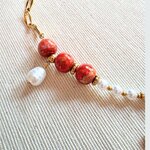 détails collier soleil de nacre