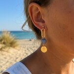 boucles horizon béton bleu nuage et acier inoxydable