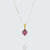Collier orchidée chaîne en acier inoxydable perle fushia en béton boheme chic
