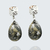 Boucles d'oreilles Poison argent en acier inoxydable et béton marbré noir avec incrustation de feuille d'argent
