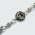 bracelet honneur en acier inoxydable disque bi en béton marbré noir avec incrustation de feuilles d'argent  pour femme