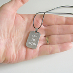 Gravé un texte sur un collier